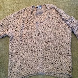 Very cozy.. stretchy… and warm! Pink with black and silver tones.